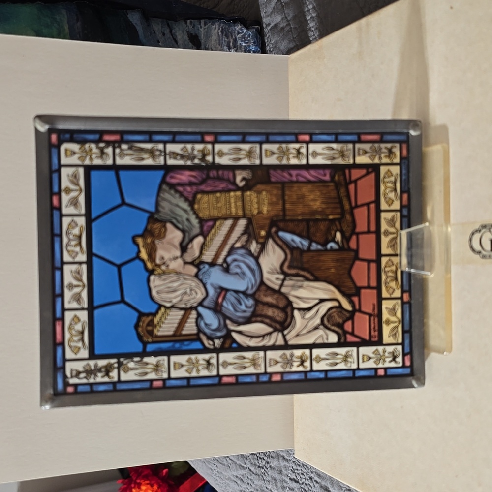 "The Kiss" stained glass by Glassmasters
